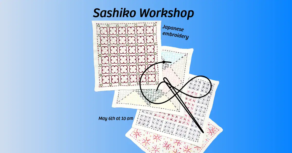 Sashiko embroidery workshop with fabric and needle on blue background.